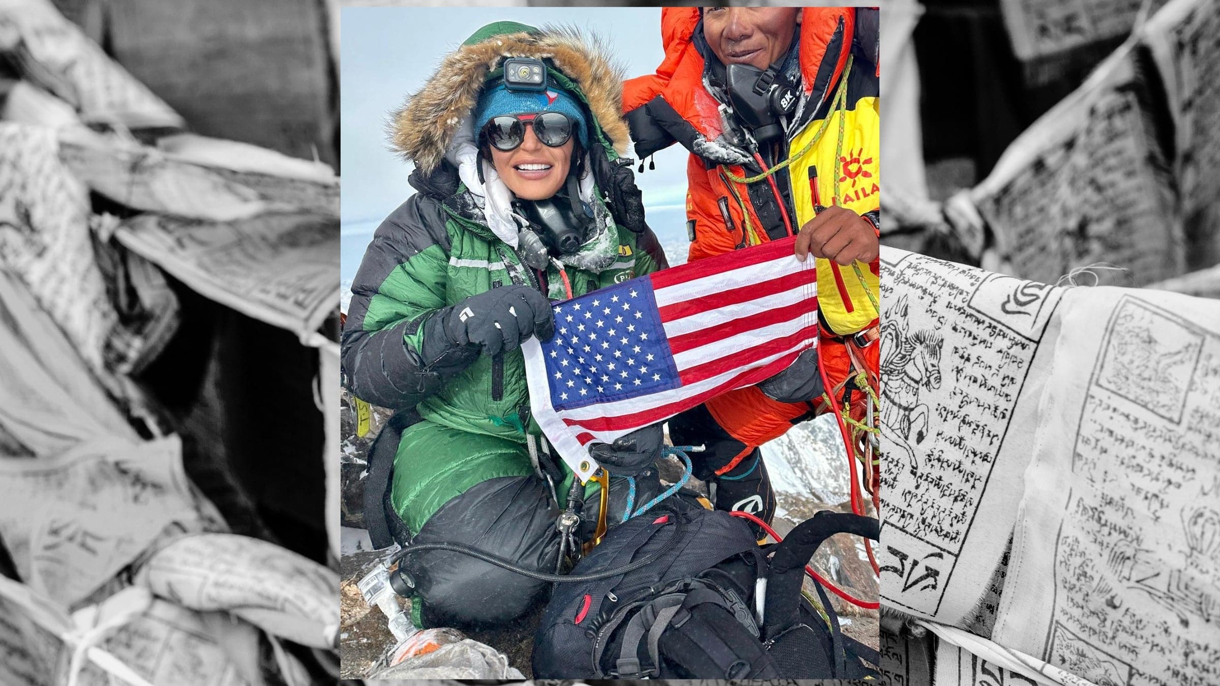 Жінка тримає американський прапор на вершині гори